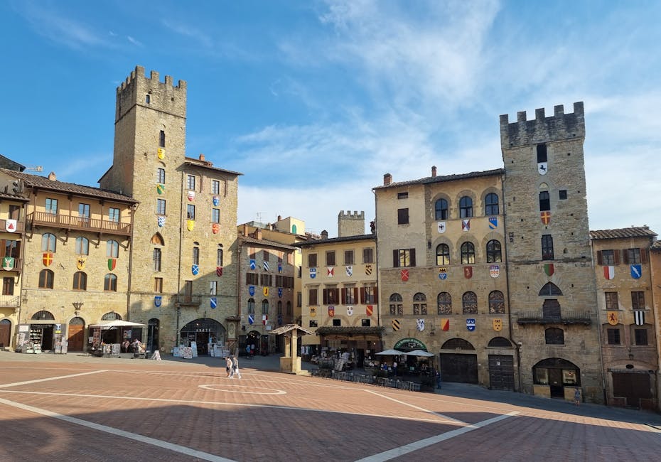 Arezzo Piazza Grande medieval buildings afternoon