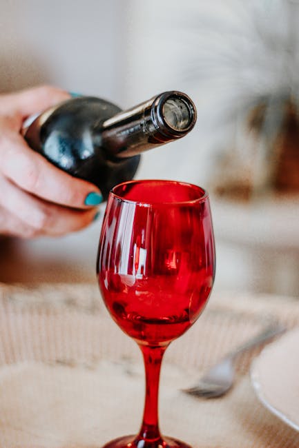 Decanting red wine Brunello glass dining table