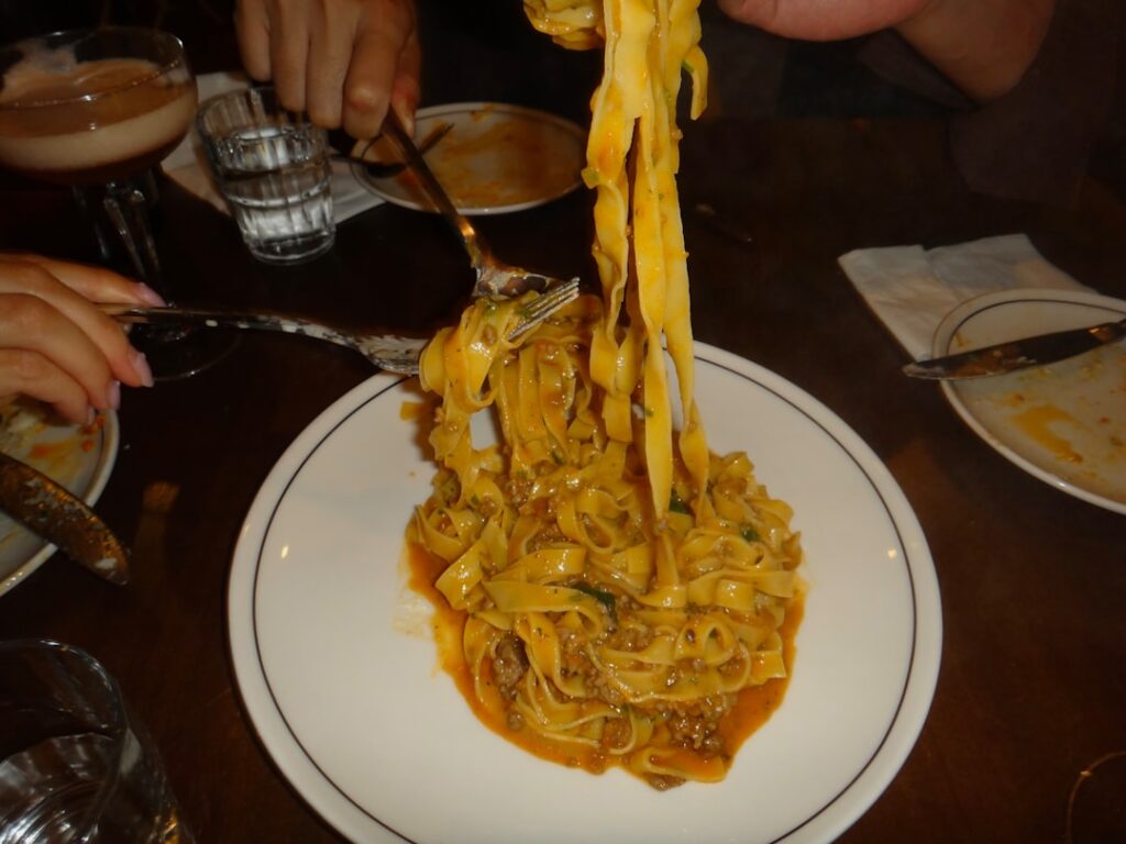 Italian pasta dish pici with sauce