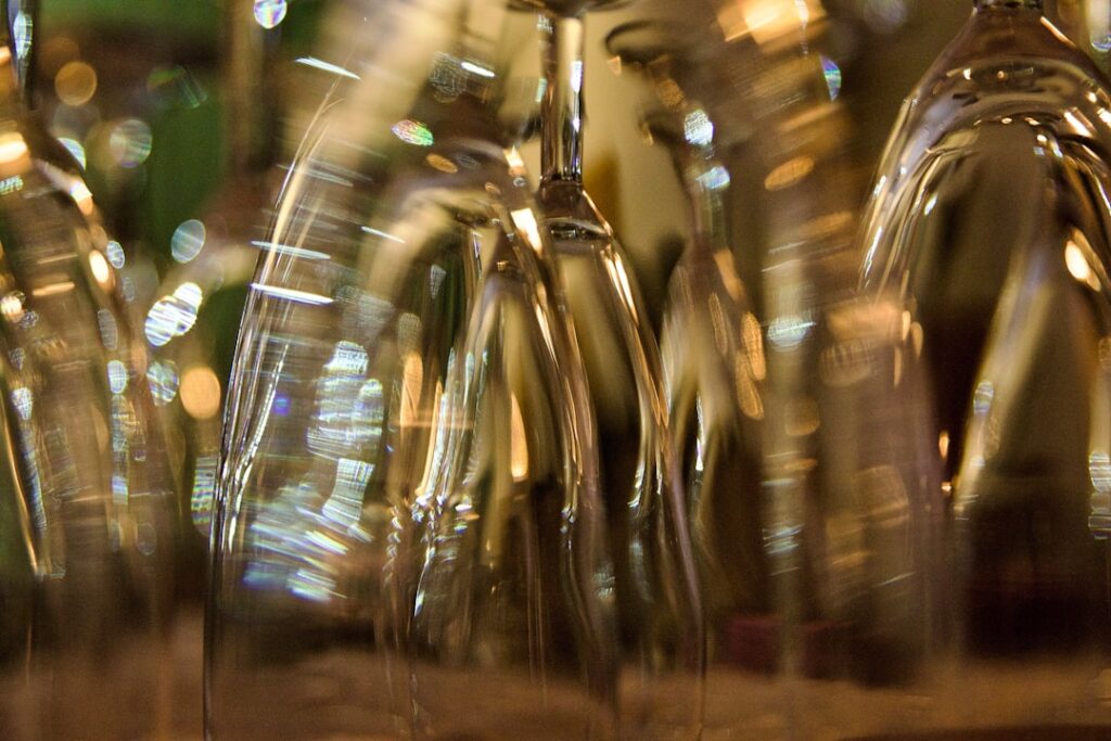 Italian wine bottle two glasses Siena restaurant