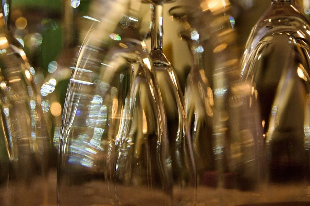 Italian wine bottle two glasses Siena restaurant