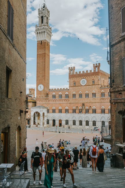 Siena Piazza del Campo midday sunlight crowd